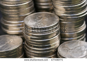 stock-photo-american-nickels-close-up-477490771
